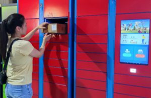 Person At Red Locker 1 300x196